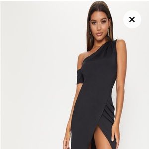 One shoulder wrap black dress .